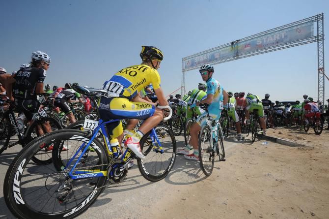 Riders await the start of stage 5.