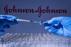 Johnson & Johnson vaccine vials and syringe.
