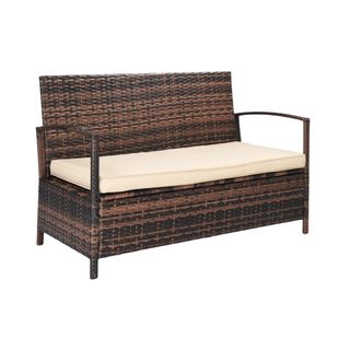 Rattan outdoor storage bench with white cushion