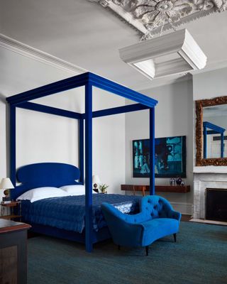 Blue four poster bed