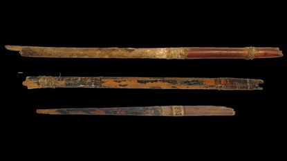 Three Neolithic arrows recovered from the Cave of Los Murci&eacute;lagos in Albu&ntilde;ol: reed and wood (above) and details of tied sinew fibres, feathers and birch bark pitch (below).