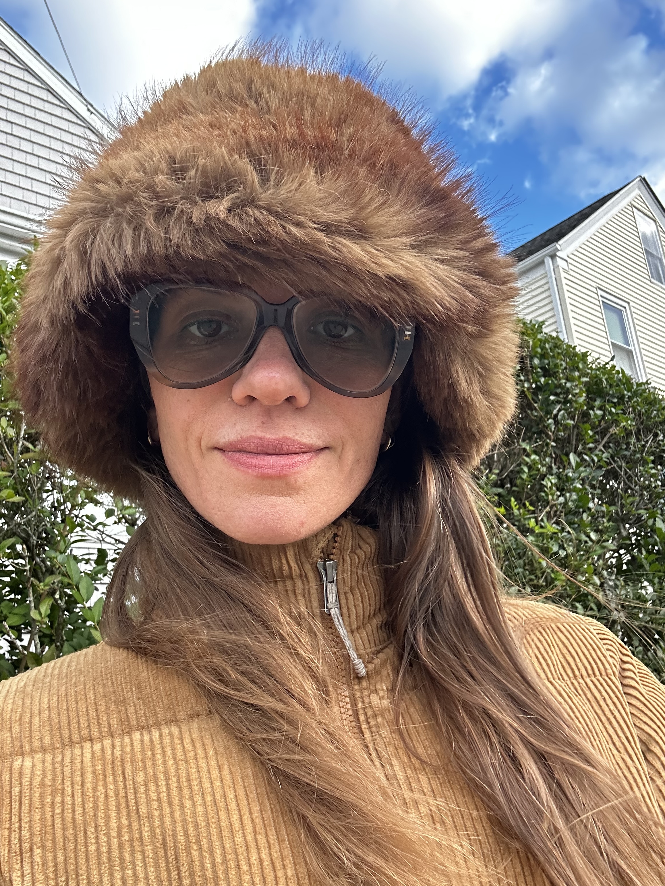 Julia Gall wearing winter hats