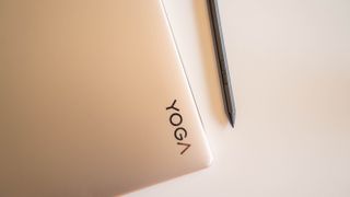 Lenovo Yoga 9i Gen 8 on a coffee table