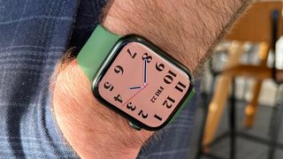 A man wears the Apple Watch Series 7 on his wrist. 