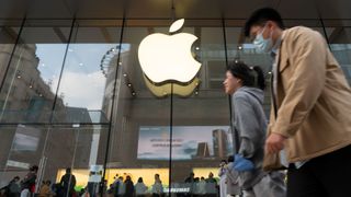 Tourists swarm outside the Apple Store on Nanjing Road pedestrian street in Shanghai, China, April 5, 2023.