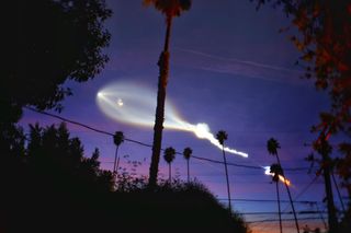 Photographer Erica Kelly Martin captured this amazing view of SpaceX's Falcon 9 rocket soaring over the palm trees of Hollywood, California after its launch from Vandenberg Air Force Base on Dec. 22, 2017.