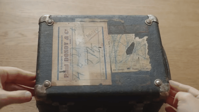 Box with CinemaScope Attachment inside being opened 