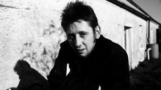 Singer and musician Shane MacGowan, of the Pogues, at the family home in Nenagh, Tipperary, Ireland, 1997. MacGowan's parents moved back to Ireland in 1988 after thirty years in England, where Shane was born and grew up