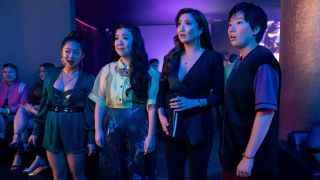 From left to right: Stephanie Hsu, Sherry Cola, Ashley Park and Sabrina Wu looking shocked in a club.