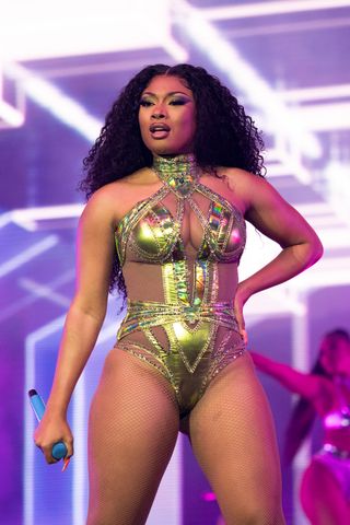 Best Coachella Fashion Looks | Singer Megan Thee Stallion performs on the Main Stage during Week 2, Day 2 of the 2022 Coachella Valley Music and Arts Festival on April 23, 2022 in Indio, California.