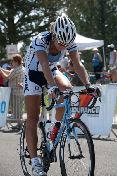 Meredith Miller (Team TIBCO) cracks a smile after crossing the finish line.