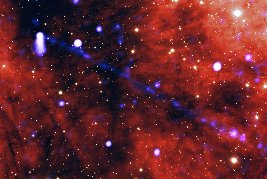 An image showing the X-ray (blue) and optical (red) view of a pulsar's trillions-miles-long beam of matter and antimatter.