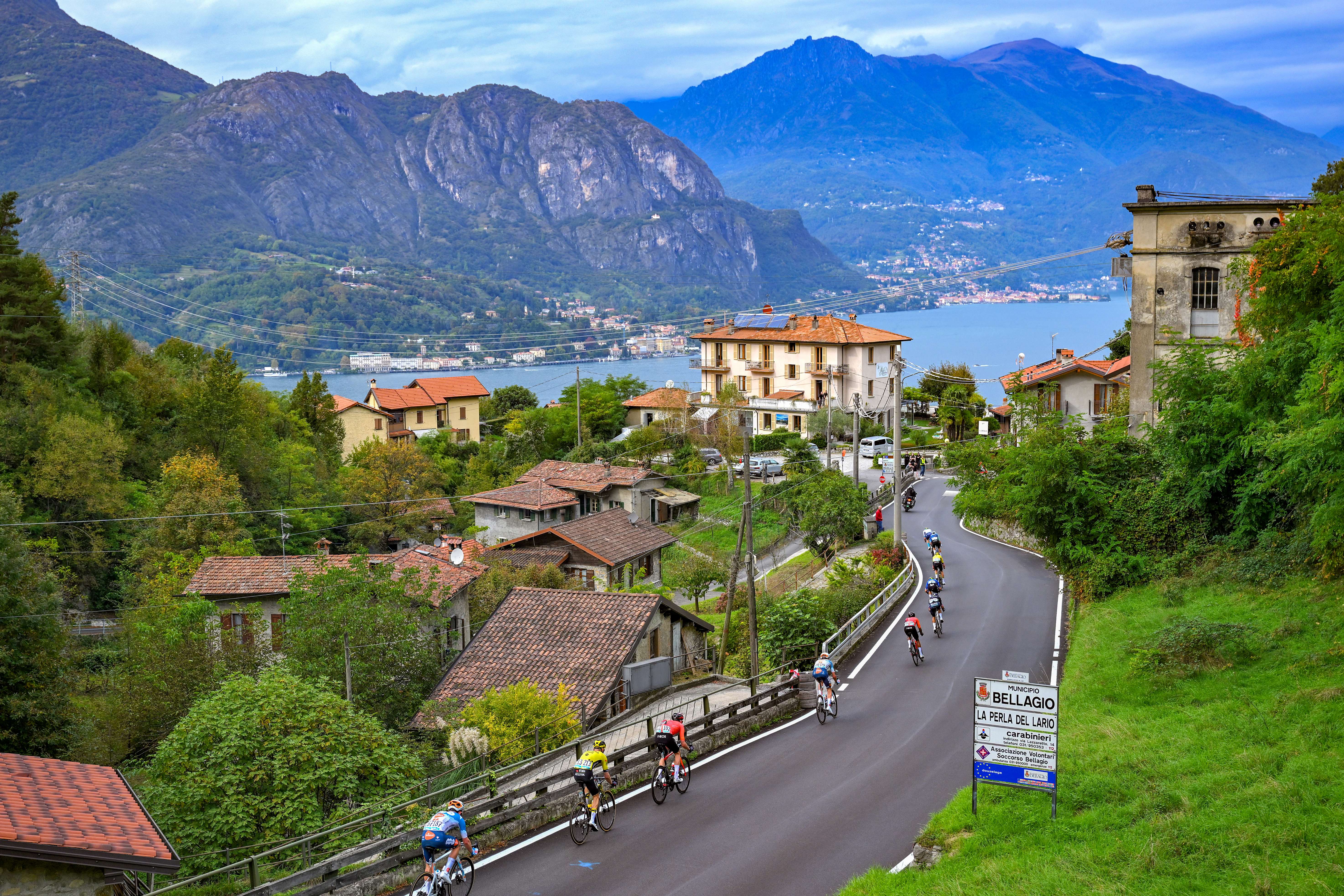 Cyclists race through a mountain town