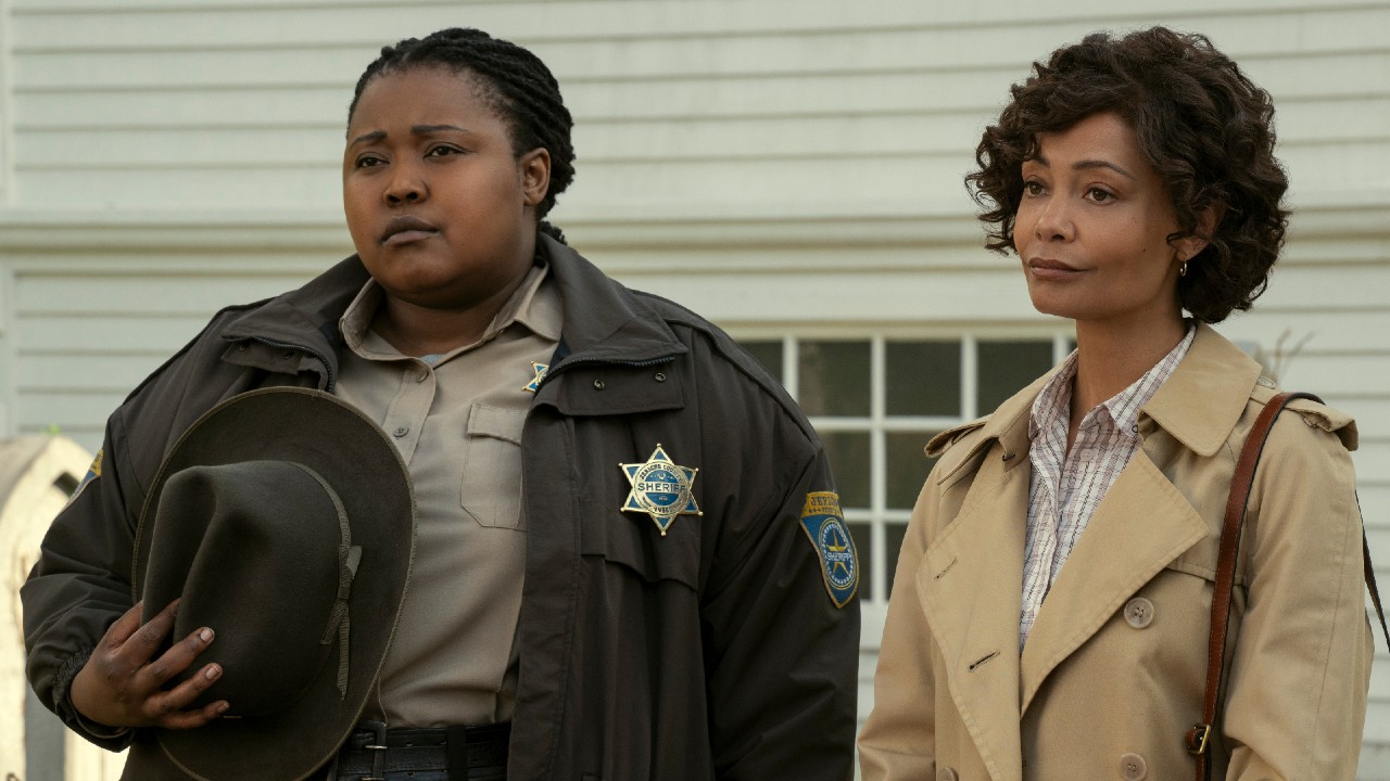 (L to R) Luyanda Unati Lewis-Nyawo as Detective Sinclair and Thandiwe Newton as Dr. Fairburn. They're both standing outside looking forward. 