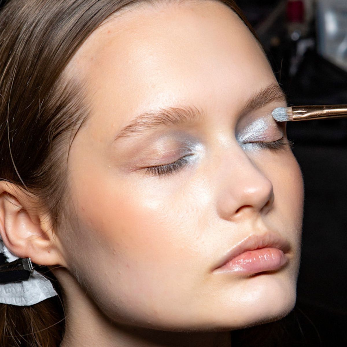 best eyeshadow - model backstage having silver eyeshadow applied