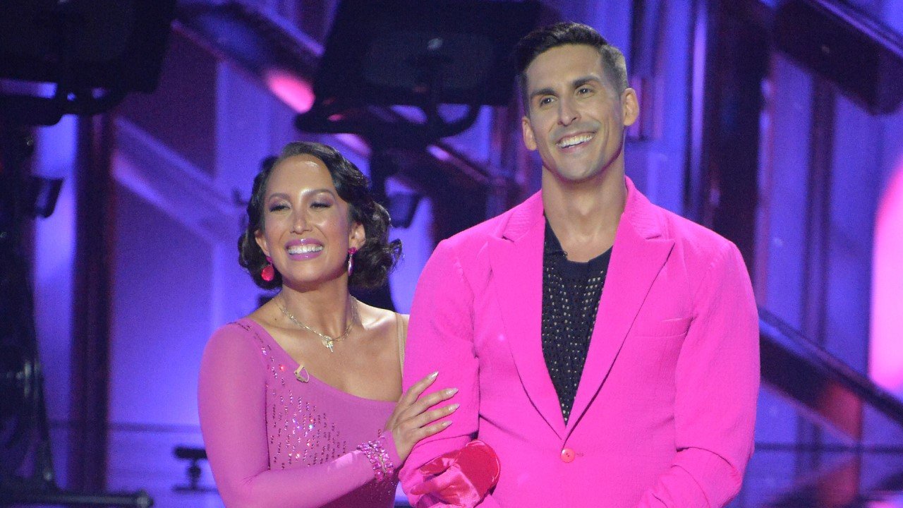 cheryl burke and cody rigsby dressed in all pink on dancing with the stars season 31 premiere