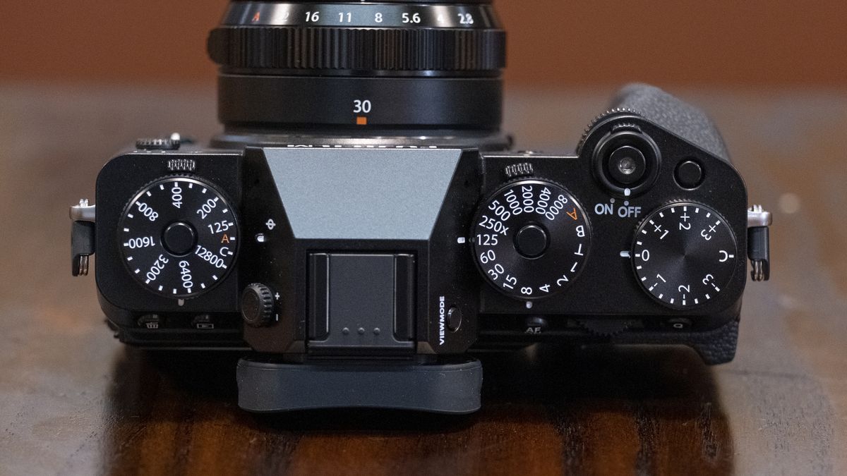 The Fujifilm X-T5 camera sitting on a table