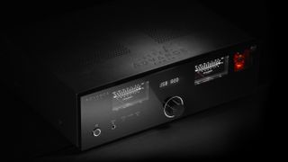 Advance Paris Apex A8 amplifier in black on a black background
