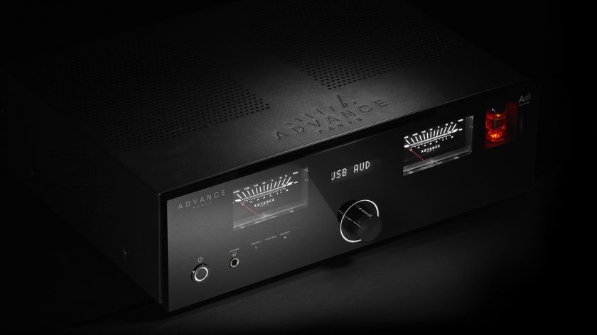 Advance Paris Apex A8 amplifier in black on a black background