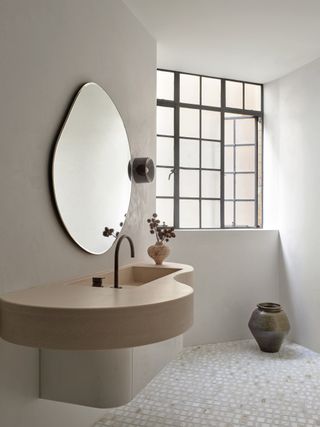 A neutral bathroom with organic curves