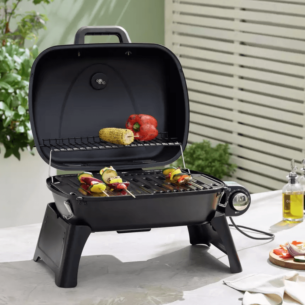 The Argos Home Electric BBQ with vegetables cooking on the grill