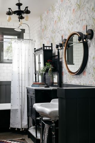 black and white bathroom with half partition wall
