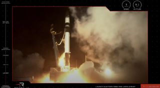 A Rocket Lab Electron booster carrying the NROL-162 satellite lifts off from New Zealand on July 13, 2022.