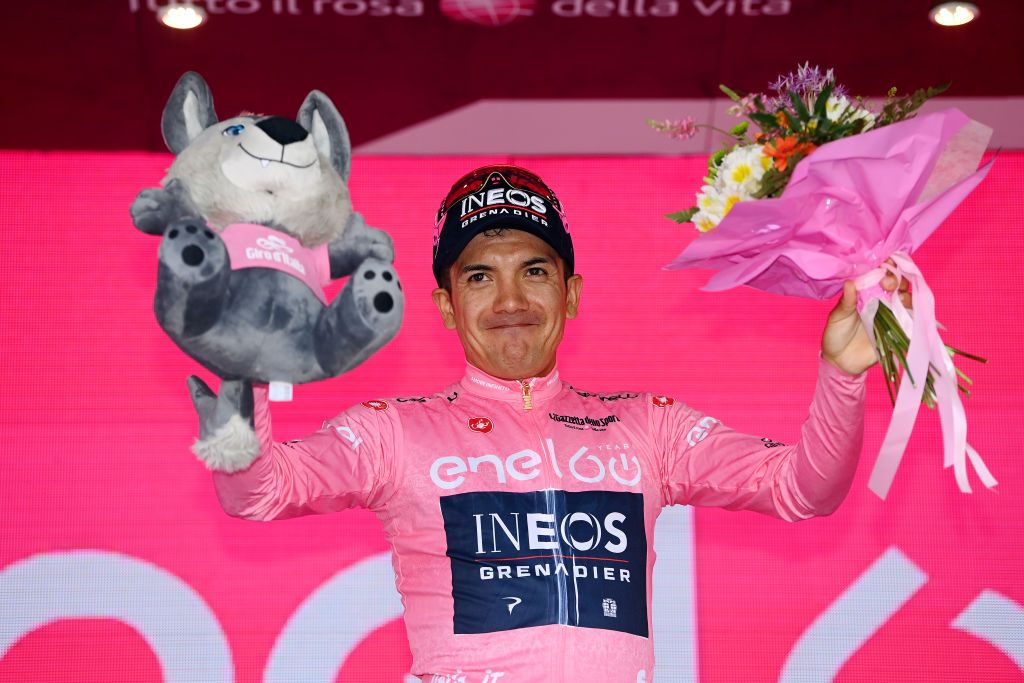 LAVARONE ITALY MAY 25 Richard Carapaz of Ecuador and Team INEOS Grenadiers celebrates winning the pink leader jersey on the podium ceremony after the 105th Giro dItalia 2022 Stage 17 a 168 km stage from Ponte di Legno to Lavarone 1161m Giro WorldTour on May 25 2022 in Lavarone Italy Photo by Tim de WaeleGetty Images