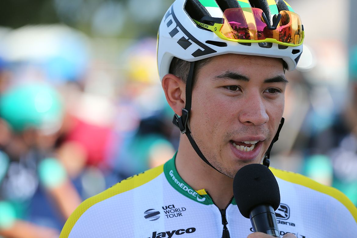Caleb Ewan talks to the press at the start