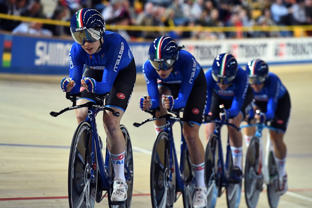 Italy's team members compete in the women's pursuit bronze medal race during the UCI Track Cycling World Championships