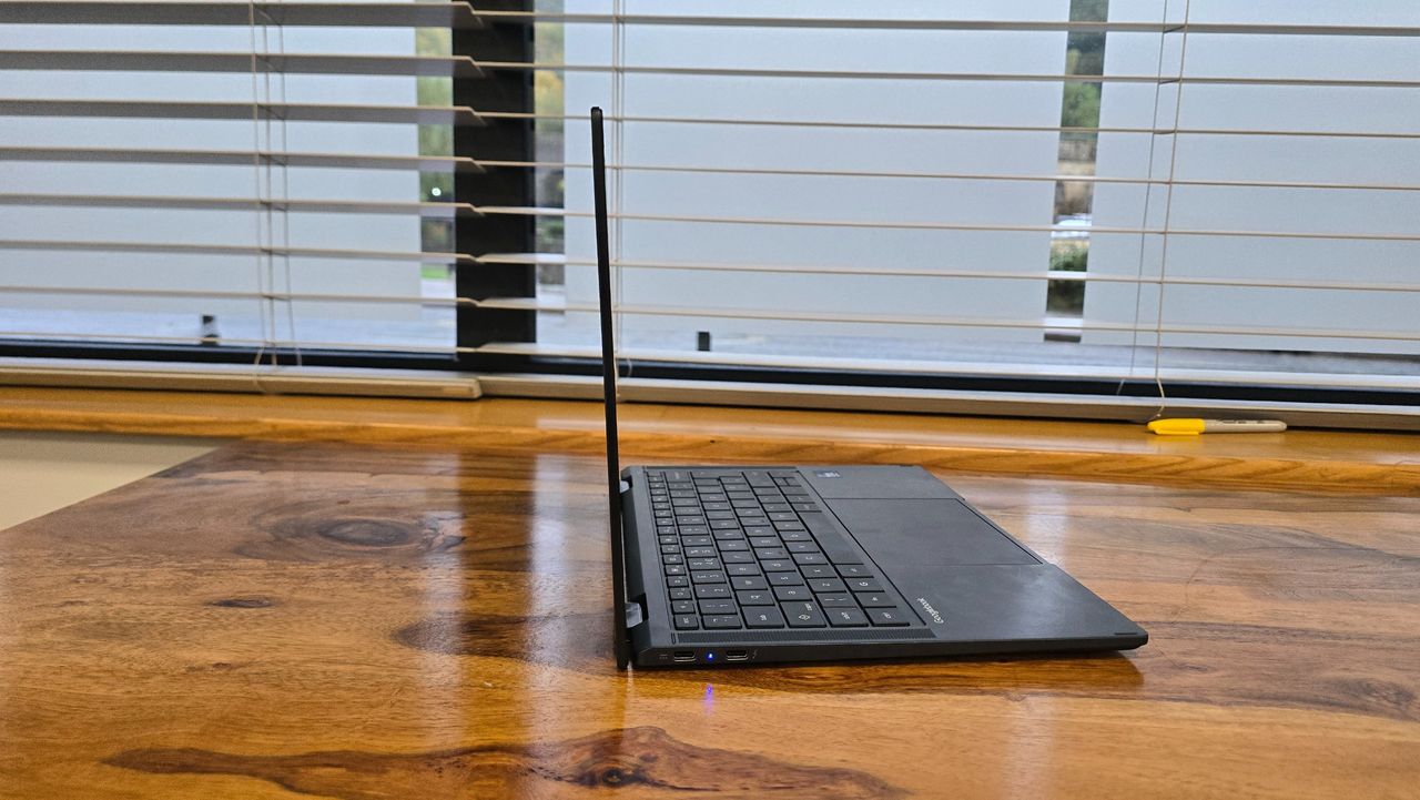 Acer Googlebook 14 on a wooden desk in an office