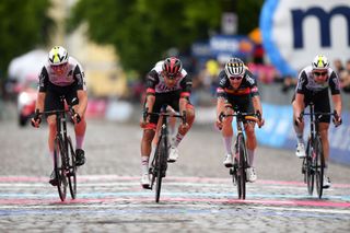 GORIZIA ITALY MAY 23 Max Walscheid of Germany and Team Qhubeka Assos Juan Sebastian Molano Benavides of Colombia and UAE Team Emirates Dries De Bondt of Belgium and Team AlpecinFenix Lukasz Wisniowski of Poland and Team Qhubeka Assos sprint at arrival during the 104th Giro dItalia 2021 Stage 15 a 147km stage from Grado to Gorizia UCIworldtour girodiitalia Giro on May 23 2021 in Gorizia Italy Photo by Stuart FranklinGetty Images