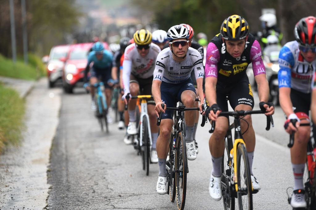 CASTELFIDARDO ITALY MARCH 14 Joao Almeida of Portugal and Team Deceuninck QuickStep White Best Young Rider Jersey Wout Van Aert of Belgium and Team Jumbo Visma Purple Sprint Jersey during the 56th TirrenoAdriatico 2021 Stage 5 a 205km stage from Castellalto to Castelfidardo 175m TirrenoAdriatico on March 14 2021 in Castelfidardo Italy Photo by Tim de WaeleGetty Images