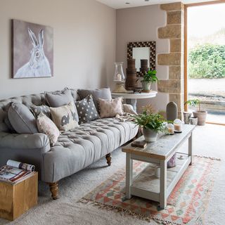living room with grey sofa