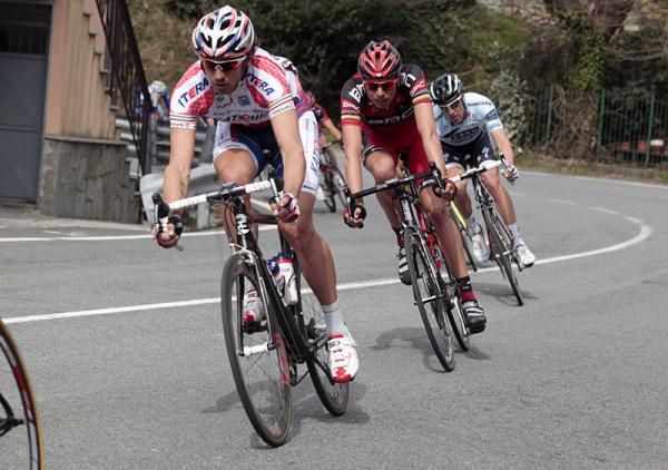 Alessandro Ballan (BMC) rides on the wheel of 2006 Milan-San Remo champion Filippo Pozzato (Katusha).