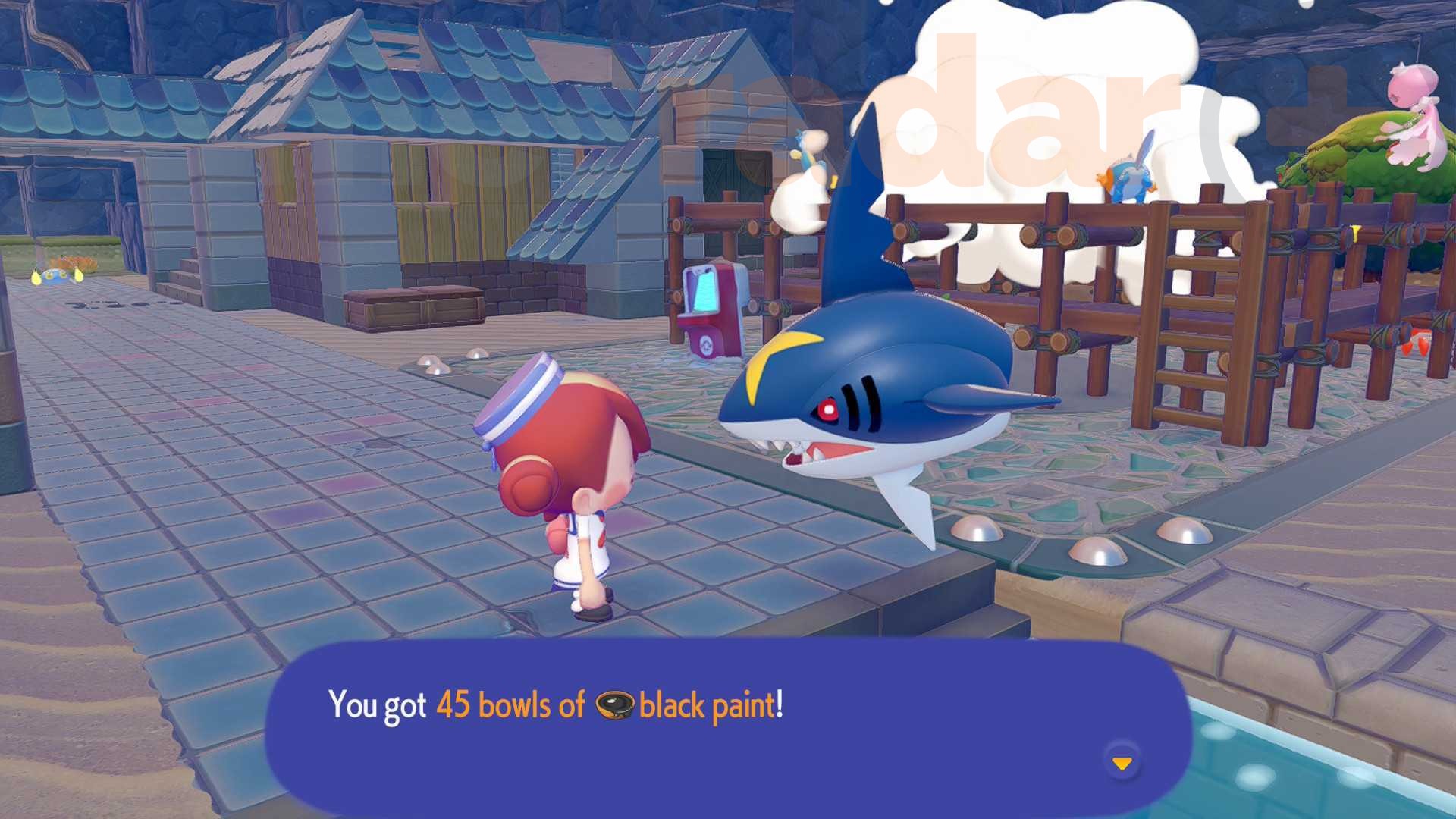Sharpedo hands Ditto 45 bowls of black Pokopia paint.