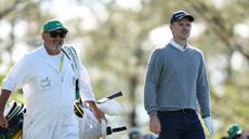 Mark 'Fooch' Fulcher (left) and Justin Rose walk during round two of the 2025 Masters