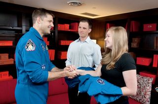 New Canadian astronauts Joshua Kutryk and Jenni Sidey (at right) meet with Canadian astronaut Jeremy Hansen.