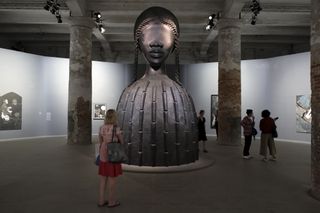 Simone Leigh's "Brick House" bronze sculpture on display in Venice for the 2022 Biennale