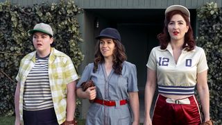 (L to R) Melanie Field (Jo), Abbi Jacobson (Carson; Co-Creator and Executive Producer), D'Arcy Carden (Greta) stand in awe in Prime Video's A League of Their Own