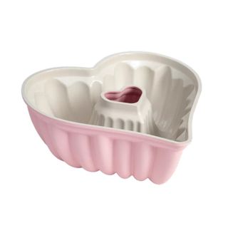 A pink and white heart-shaped cake mold
