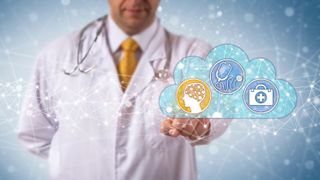 Doctor with an image of a cloud in front of him