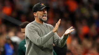 Jurgen Klopp, wearing a black baseball cap, applauds his Germany players during a Nations League 2026/27 match