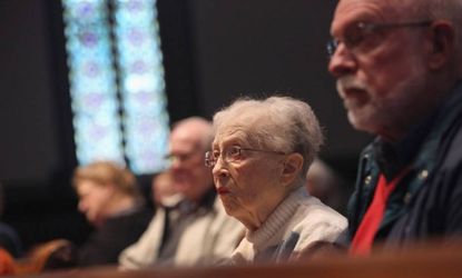 Congregation members attend a Sunday service at the First Presbyterian Church in Warren, Ohio, days before the 2012 election.