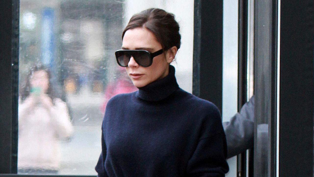 Victoria Beckham wearing turtle neck jumper