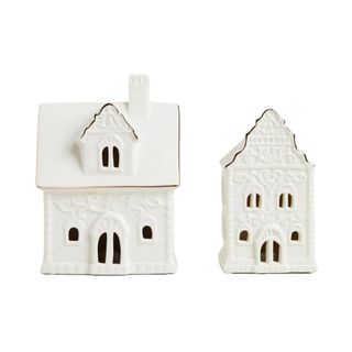 Two white ceramic houses 