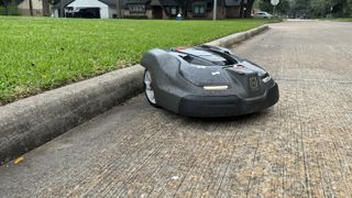 Automower 450XH rolled off the curb