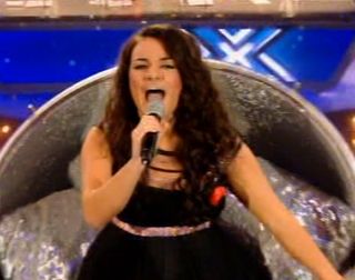 Laura appeared on stage in a glitterball-shaped chair