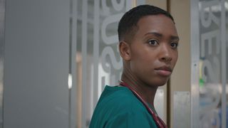 Archie Hudson looks on shocked when a familiar face returns to the ED in Casualty