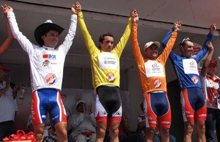 The jersey holders celebrate after the penultimate stage.